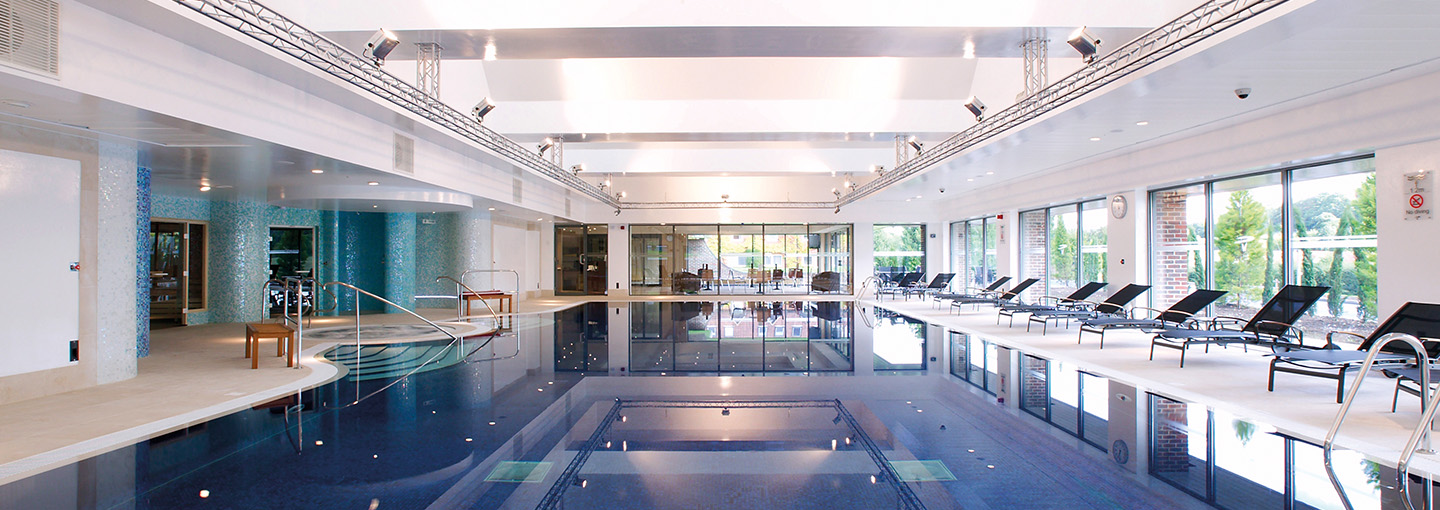 wide shot of spa pool and loungers