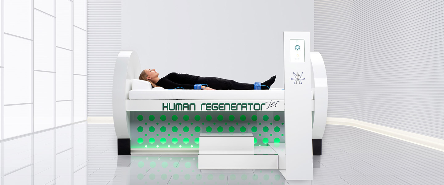 woman lying on human regenerator machine in white room
