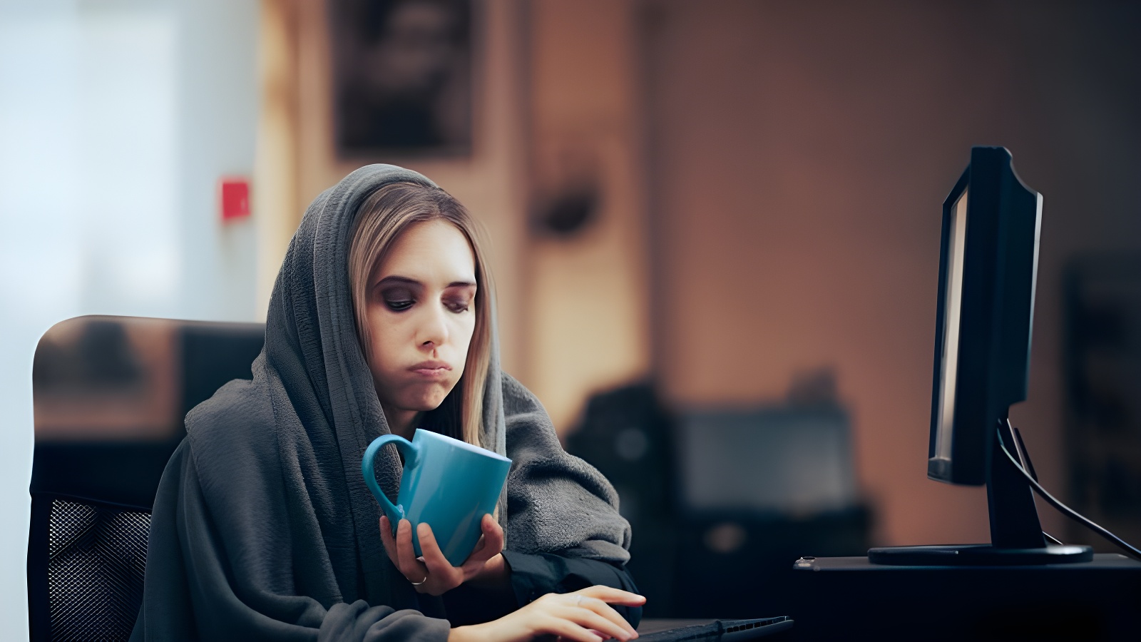 Woman covered in a blanket